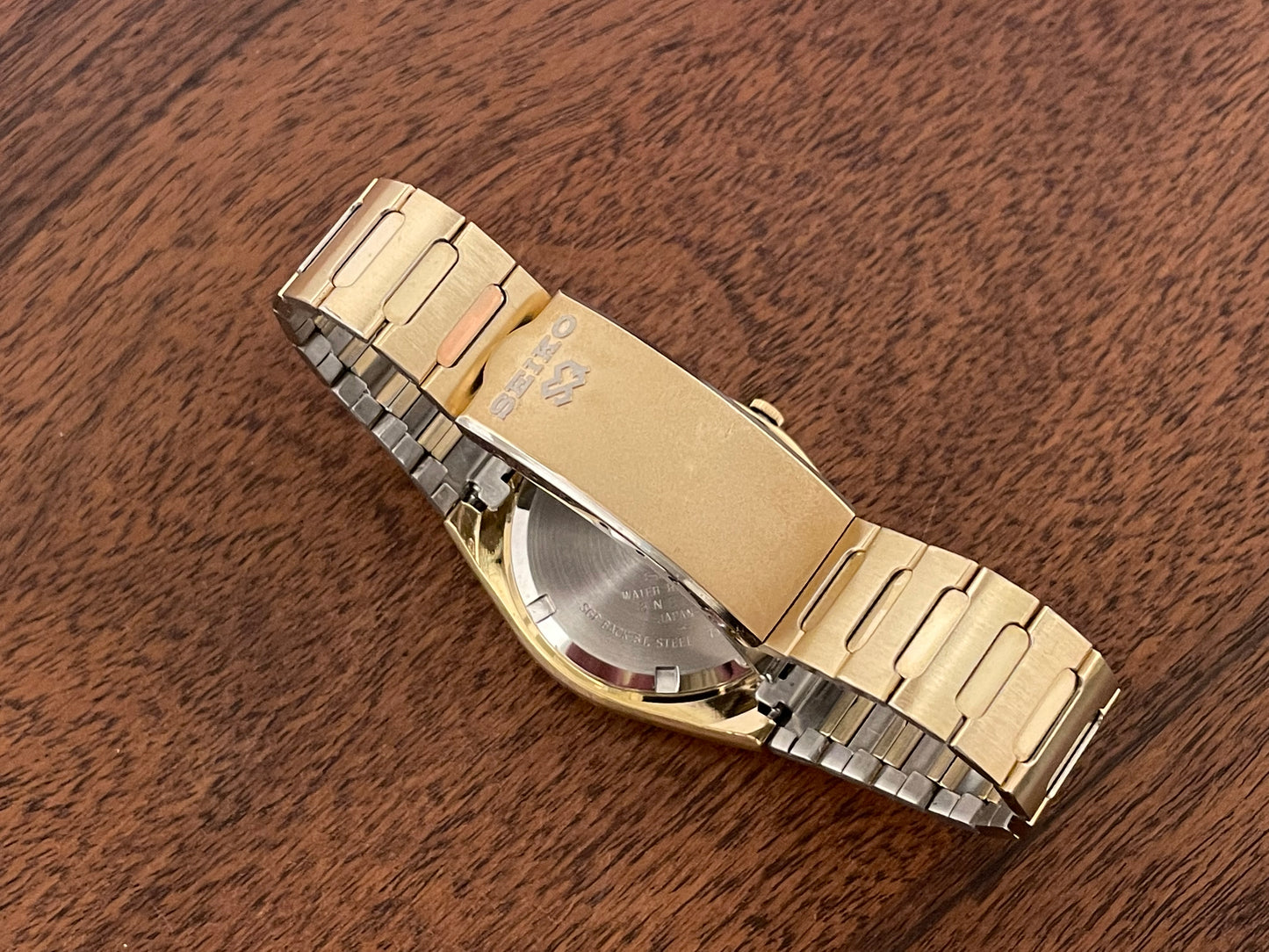 (1988) Seiko 7123-9000 SQ gold colored case with integrated bracelet (serviced)