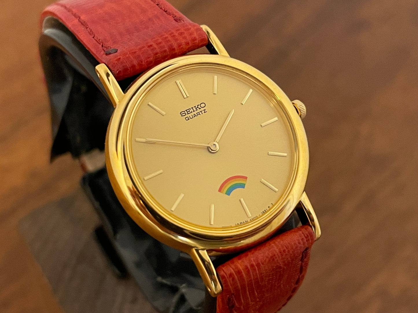 (2002) Seiko 4N00-0711 Quartz "Arcobaleno" dress watch - gold dial w/ rainbow logo - small size (NOS)