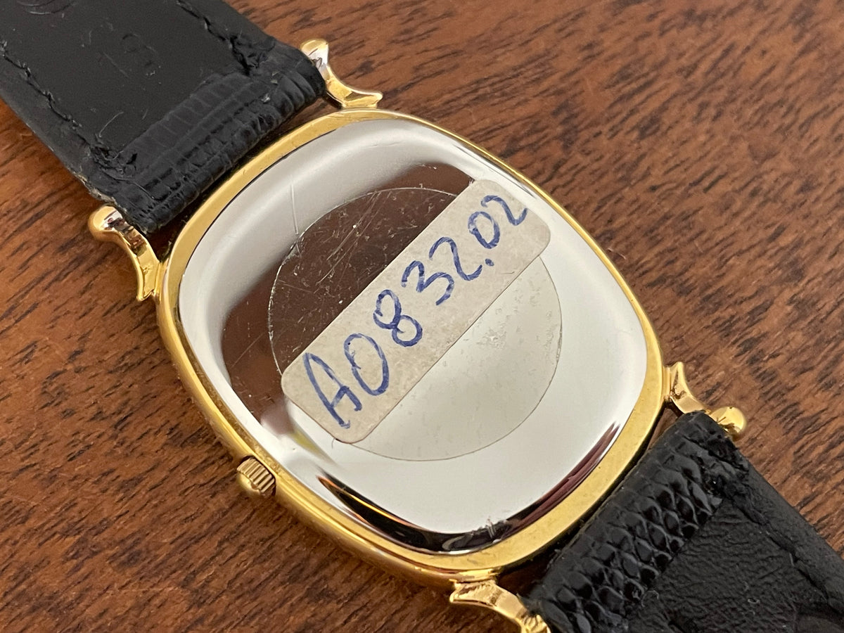 (1990s) Coursier dress watch - petrol blue sunburst dial w/ gold Roman numerals (NOS)