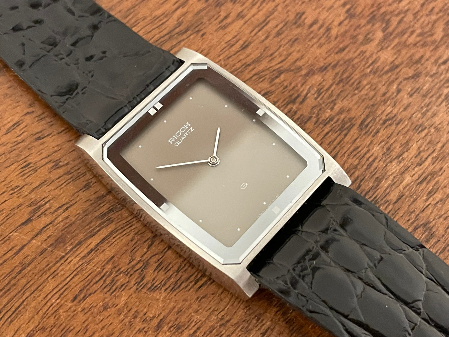 (1970s/1980s) Ricoh 632042 Riquartz "Tank" dress watch - flat taupe dial w/ white markers (NOS)