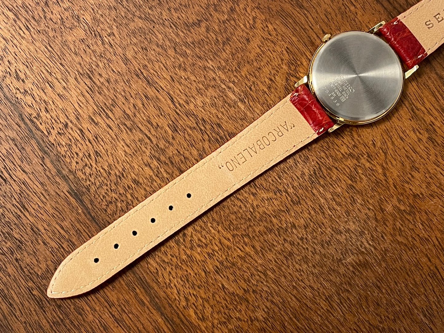 (2002) Seiko 7N22-8A00 Quartz "Arcobaleno" dress watch - white dial w/ rainbow logo (NOS)
