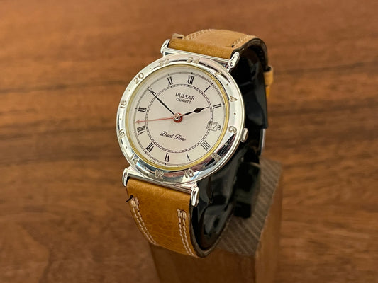 Front side (1988) Pulsar V339-6000 GMT  “Dual Time” dress watch - white dial w/ Roman numerals (NOS)