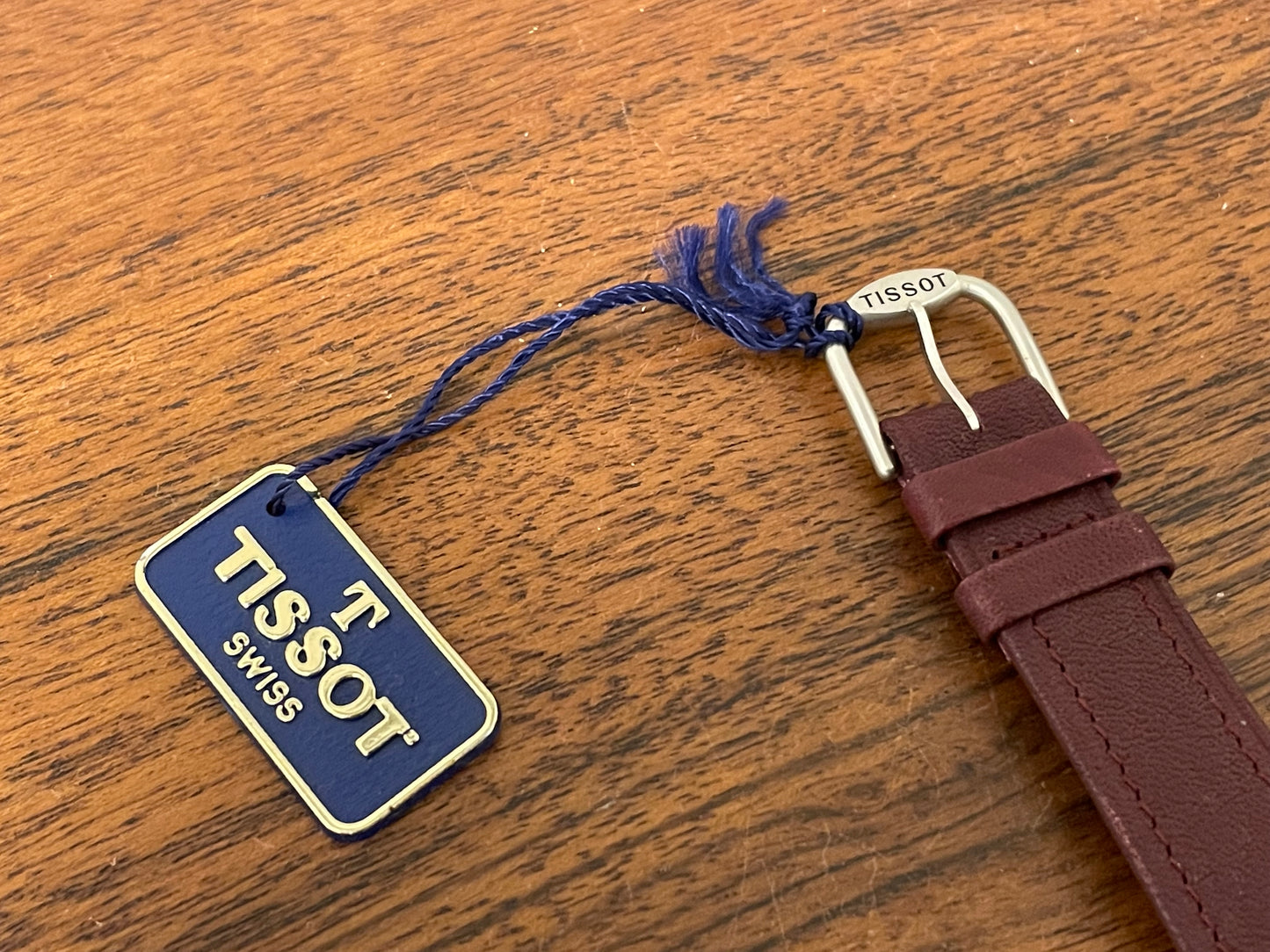 (1980s) Tissot RockWatch R150 burgundy granite - mid size model (NOS)