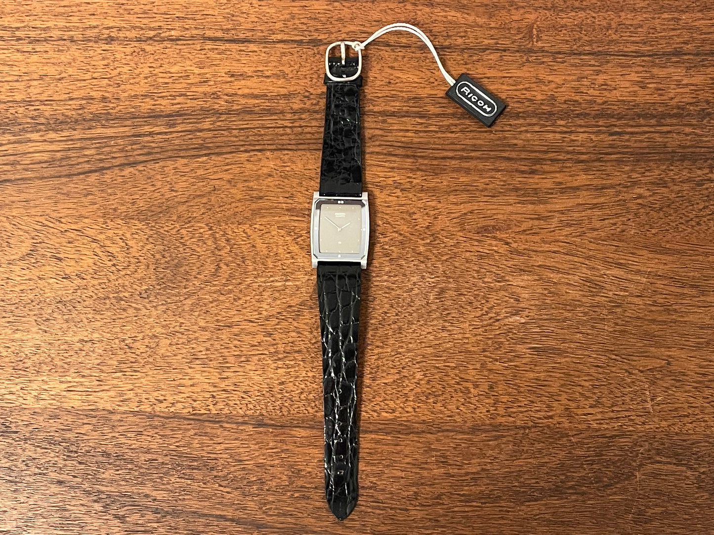 (1970s/1980s) Ricoh 632042 Riquartz "Tank" dress watch - flat taupe dial w/ white markers (NOS)