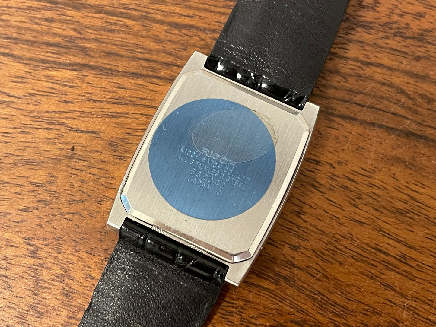 (1970s/1980s) Ricoh 632042 Riquartz "Tank" dress watch - flat taupe dial w/ white markers (NOS)