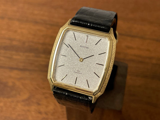 1970's Ricoh 632005 Riquartz "Tank" with silver dust dial front view