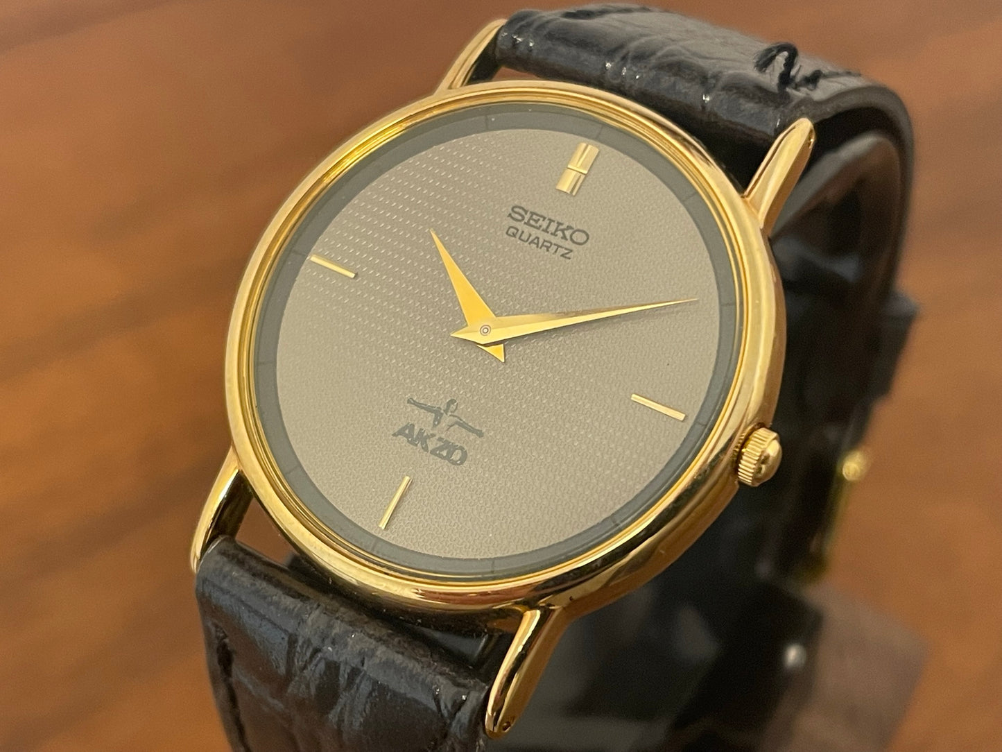 (1989) Seiko 5Y30-7000 dress watch with AKZO brand logo  (NOS)