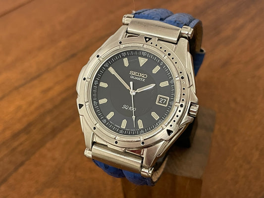 (1994) vintage Seiko 7N47-6A00 SQ100 with date function (serviced) front view