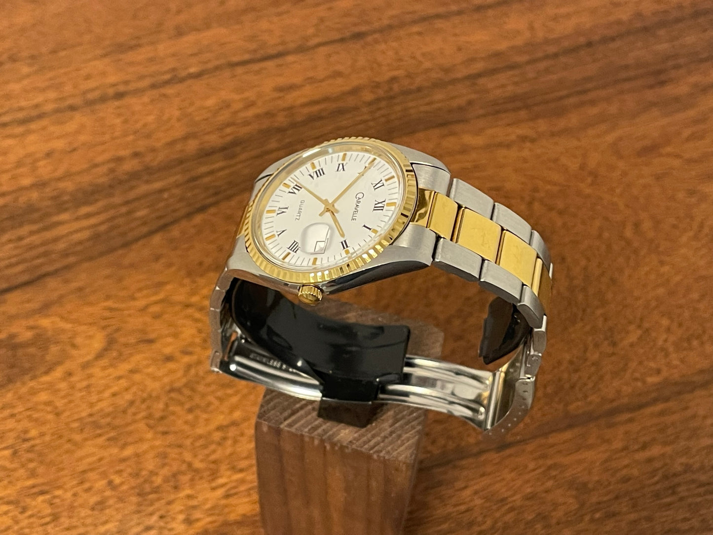 (1980s) Caravelle (manufactured by Bulova) “Datejust” dress watch