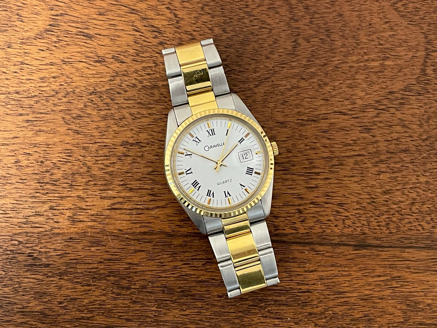 (1980s) Caravelle (manufactured by Bulova) “Datejust” dress watch