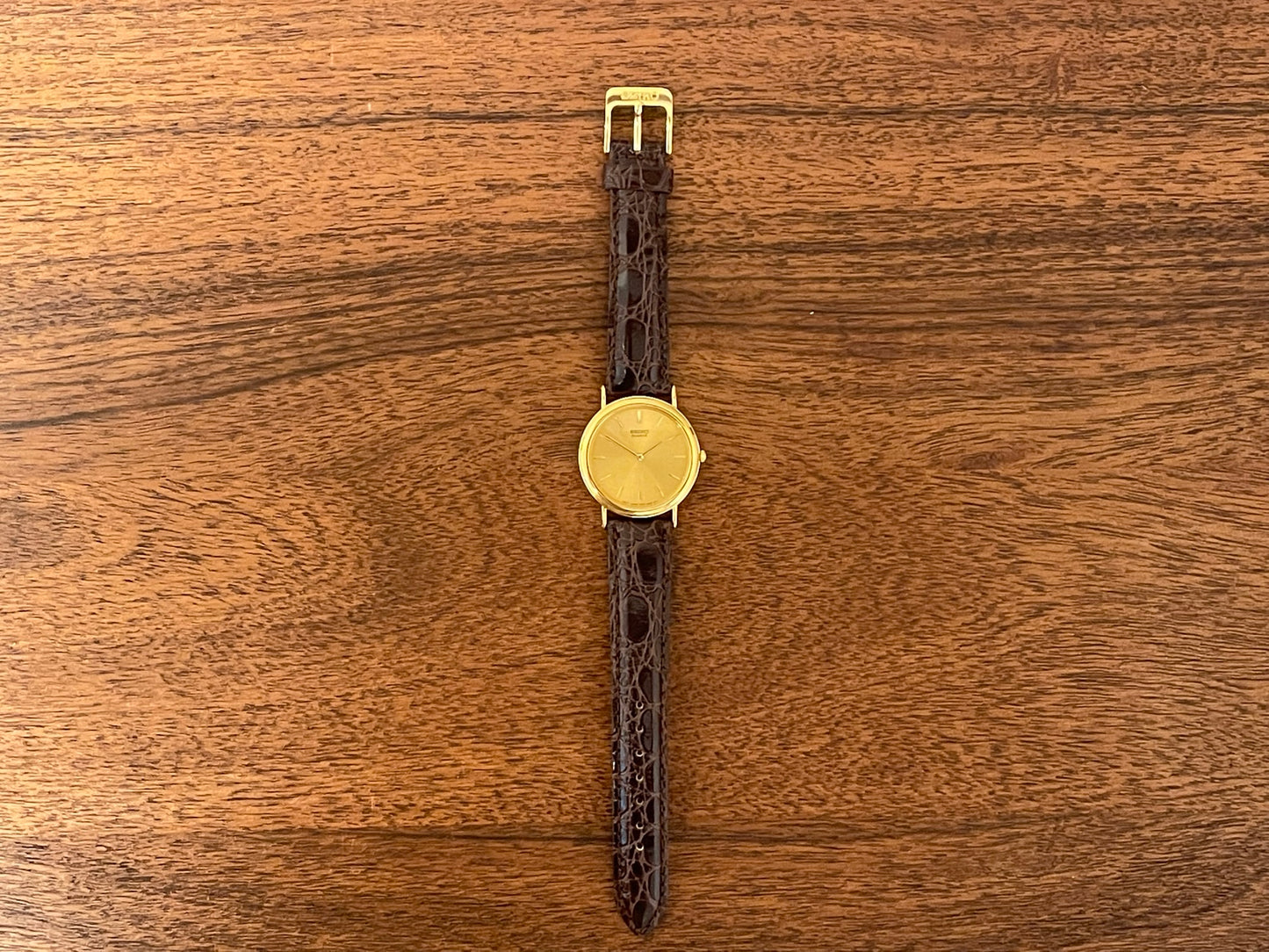 (2002) Seiko 7N00-6A70 Quartz dress watch -gold dial w/ gold markers - small size