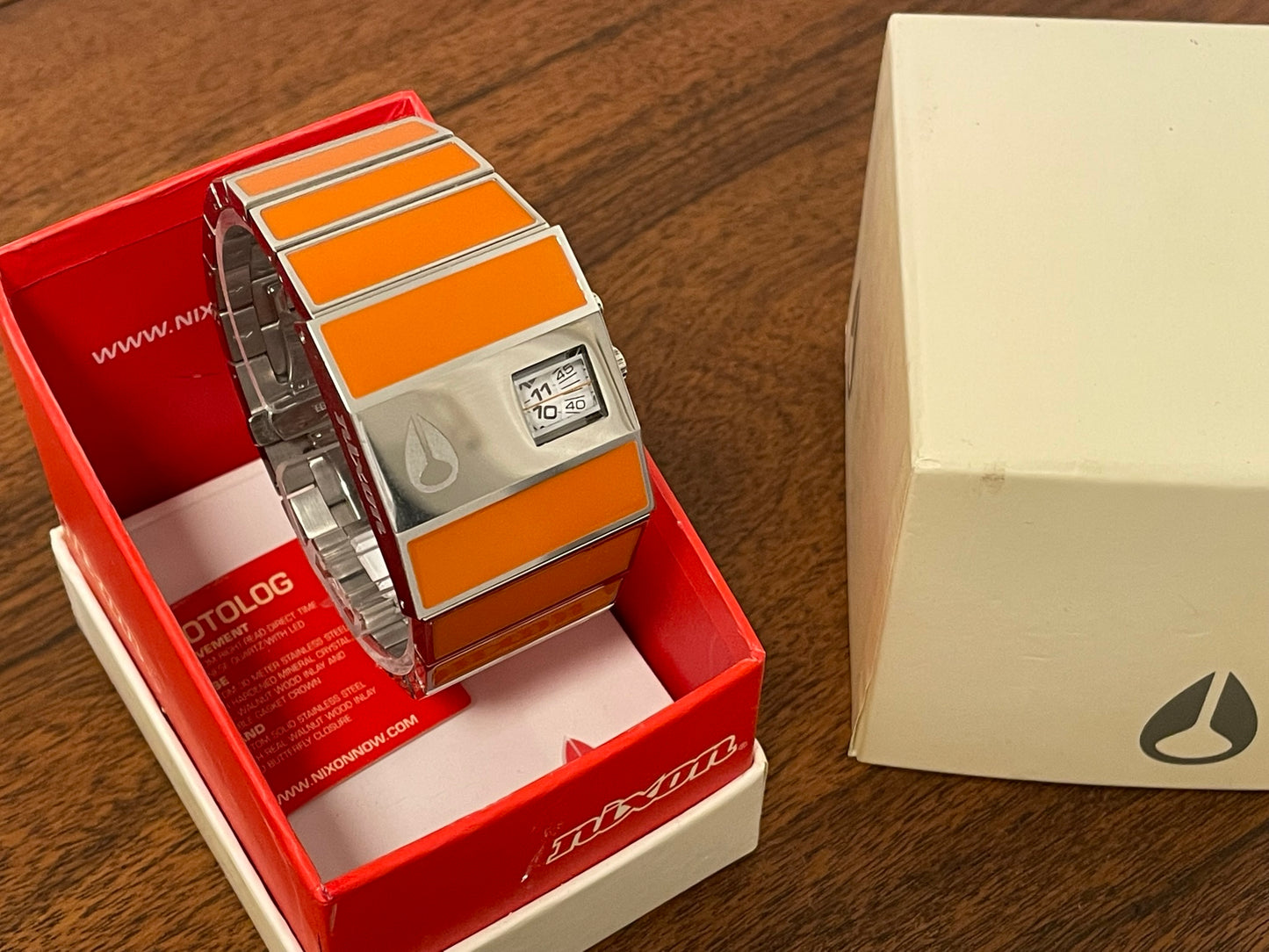 (2010s) Nixon Rotolog orange - Direct time technology (NOS)