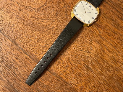 (1970s) Tissot Stylist dress watch - gold “tv case” - white dial w/ black Roman numerals (NOS)