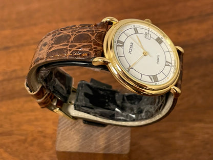 (2000) Pulsar V532-8A60 dress watch - gold colored case - white dial w/ black Roman numerals (NOS)