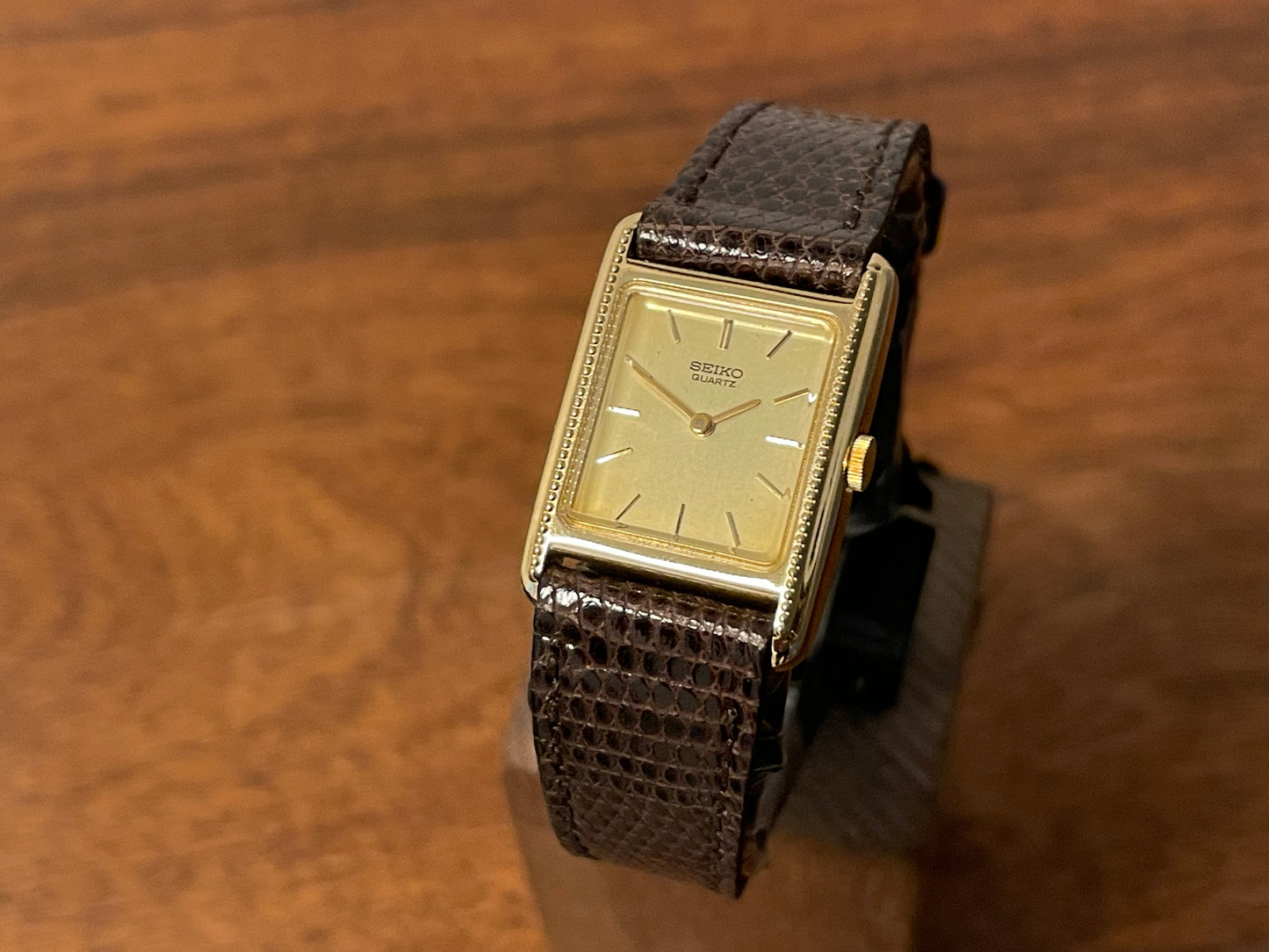 Front side (1982) Seiko 5420-5100 "Tank" dress watch - brushed gold dial w/ gold markers - small size (NOS)