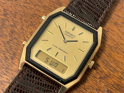 (1984) Seiko H448-5130 Alarm Chronograph - gold dial w/ gold markers & digital display