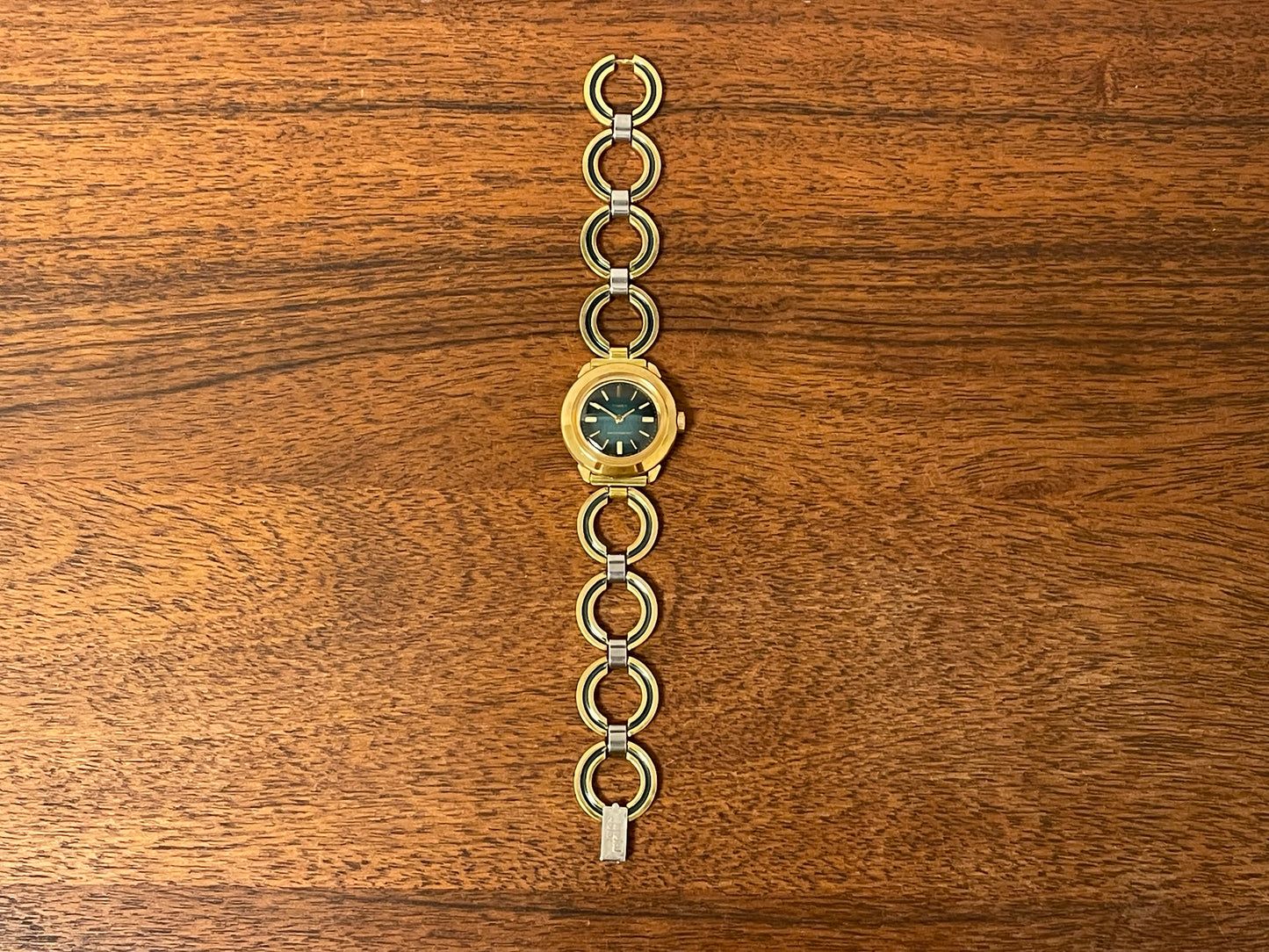 (1970s) Timex 551-211 dress watch - gold case - green dial w/ gold markers - small size (NOS + full set)