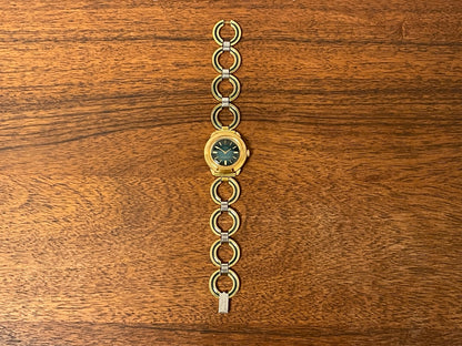 (1970s) Timex 551-211 dress watch - gold case - green dial w/ gold markers - small size (NOS + full set)