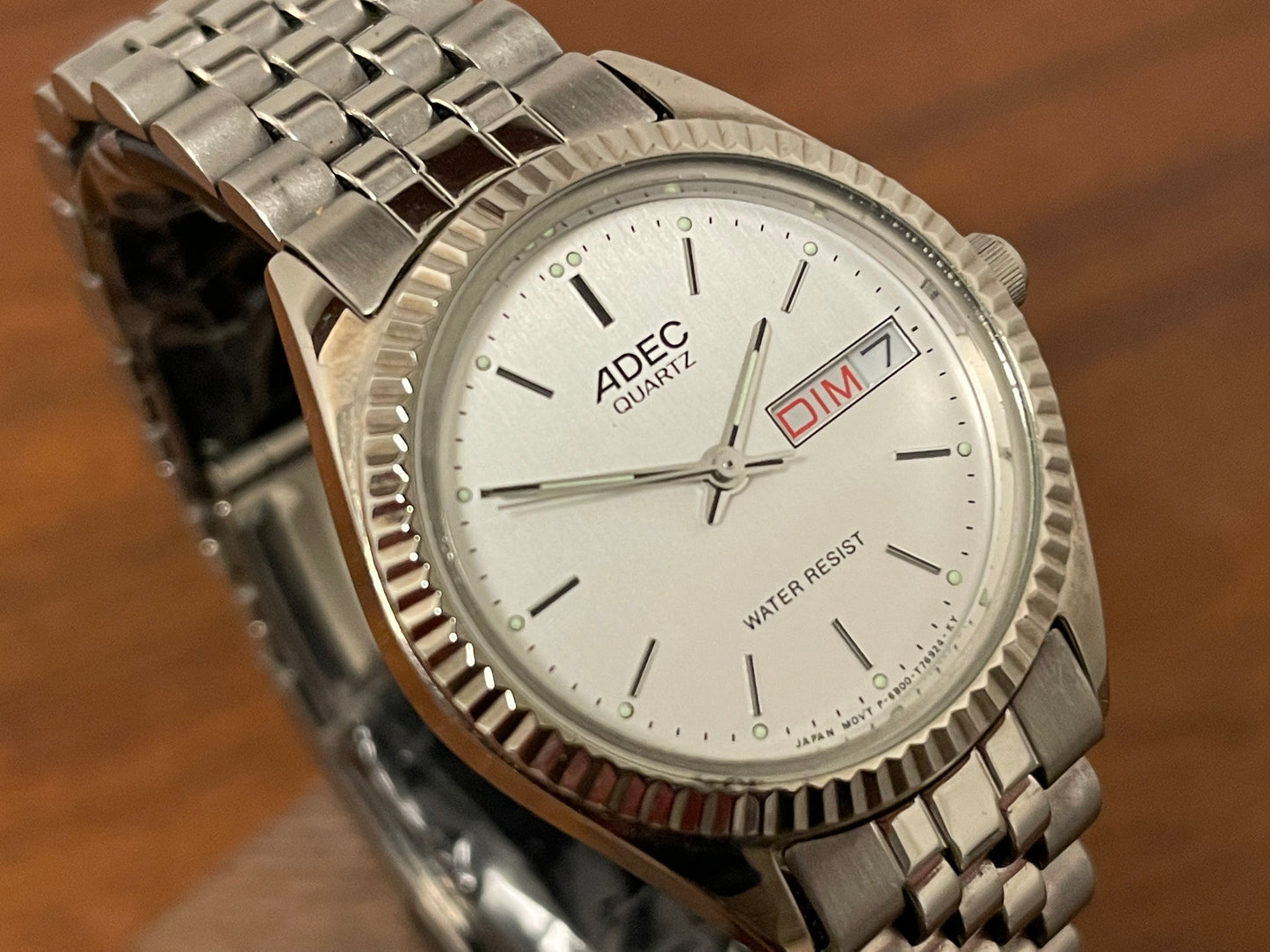 (1980) ADEC (by Citizen) "Day-Date" - fluted bezel - silver dial w/ stick markers - small size (NOS)