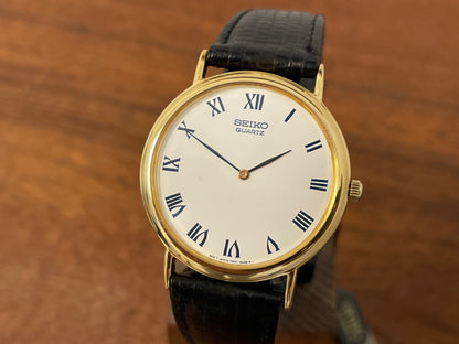 (1991) Seiko 7N00-8A00 dress watch - white dial w/ Roman numerals & Leafe hands (NOS)