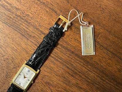 (1990s) Seiko 7N01-0BA8 18K gold collection "tank" - 18k solid gold case - white & cream dial (NOS + full set)