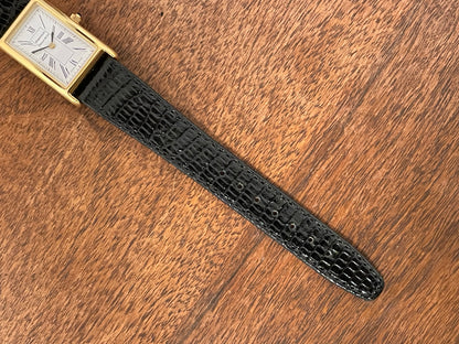 (1998) Tiffany & Co. Portfolio "Tank" dress watch - gold case - white dial w/ black Roman numerals (Mint)