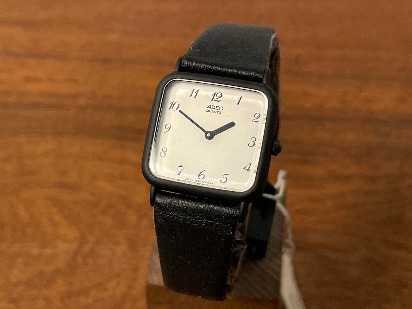 Front side (1983) ADEC (by Citizen) 2028-395808 "TV case" - black case - silver dial w/ black Arabic numerals (NOS)
