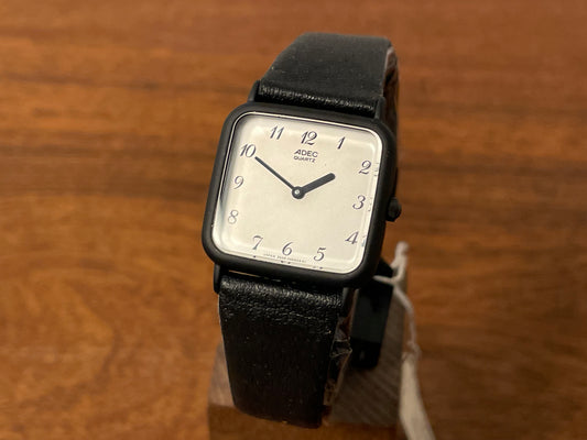 Front side (1983) ADEC (by Citizen) 2028-395808 "TV case" - black case - silver dial w/ black Arabic numerals (NOS)
