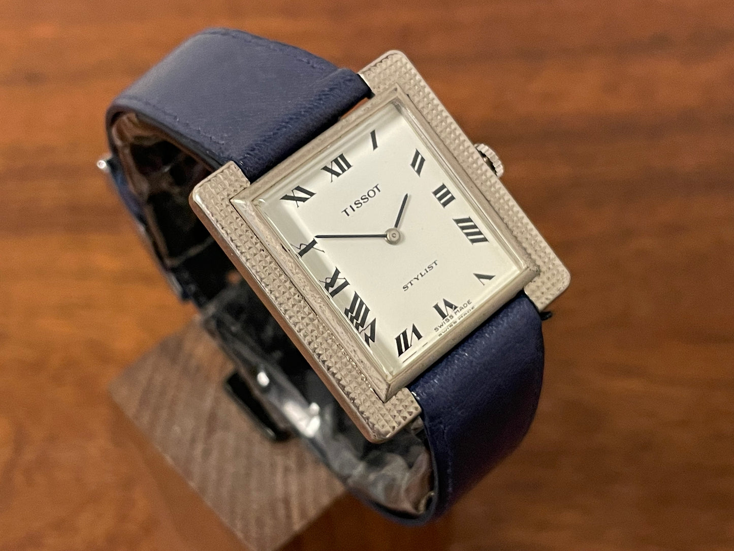 (1970s) Tissot Stylist "Tank" - decorated case - white dial w/ black Roman numerals (NOS)