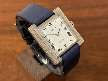 (1970s) Tissot Stylist "Tank" - decorated case - white dial w/ black Roman numerals (NOS)