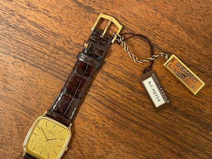 (1981) Seiko 5930-5509 Lassale dress watch - gold textured dial w/ gold stick markers (NOS)