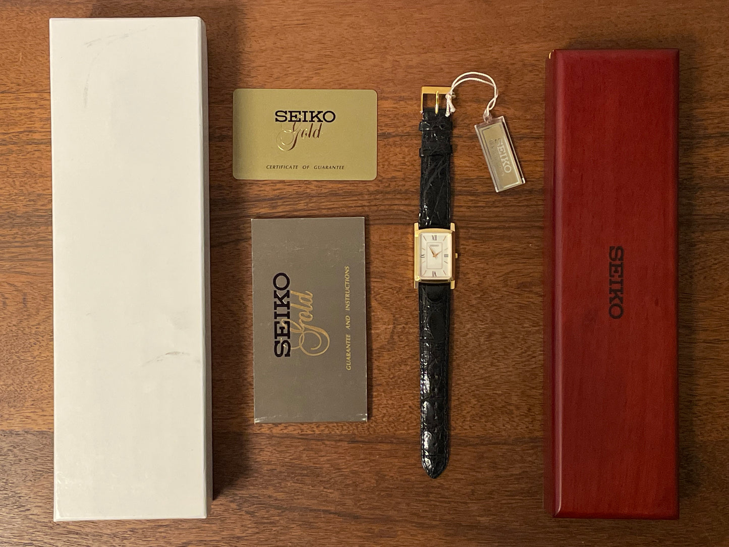 (1990s) Seiko 7N01-0BA8 18K gold collection "tank" - 18k solid gold case - white & cream dial (NOS + full set)