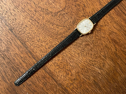 (1981) Seiko 5420-5119 "Ellipse" - gold plated case - silver sunburst dial w/ gold markers - small size (NOS)