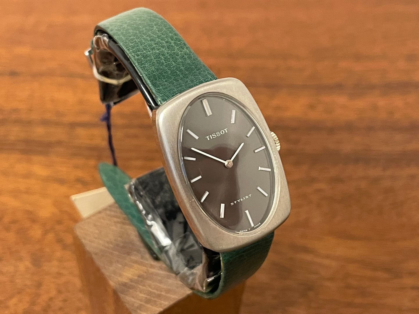 (1970s) Tissot Stylist dress watch - oval grey sunburst dial w/ white stick markers - small size (NOS)