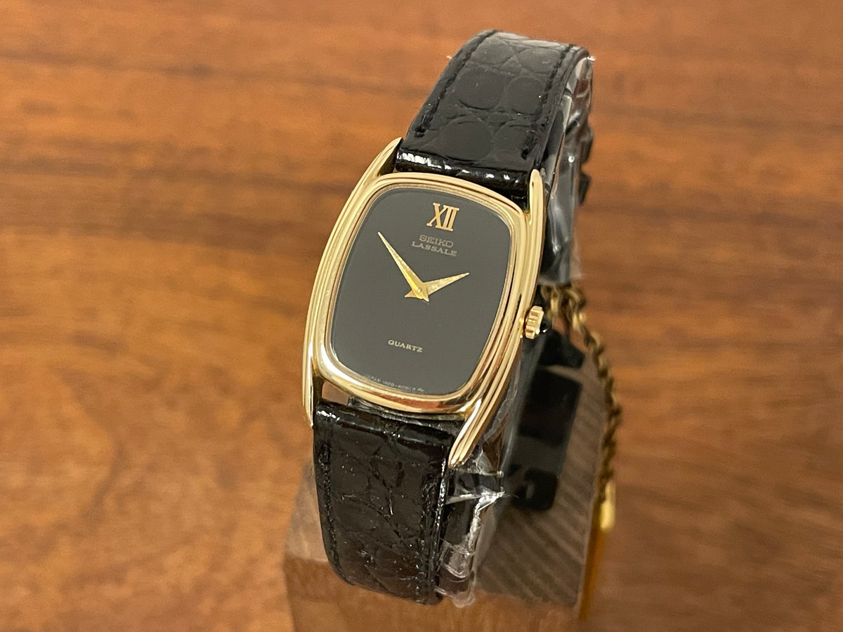 Front side (1980) Seiko 1400-7249 Lassale "Ellipse" dress watch - black dial w/ gold Roman numerals - small size (NOS)