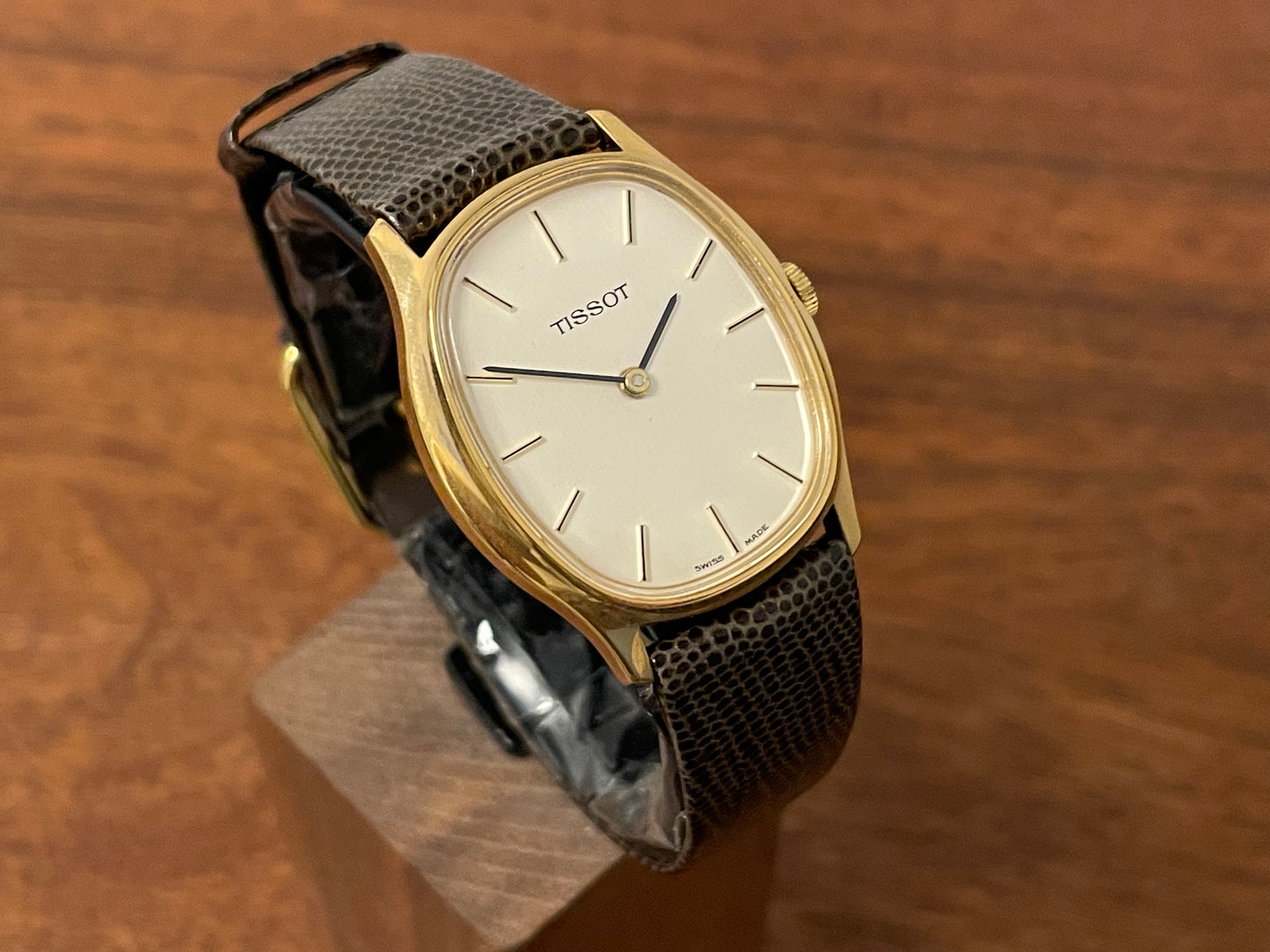 (1970s) Tissot 41141 "Ellipse" dress watch - gold case - silver brushed dial w/ gold stick markers (NOS)