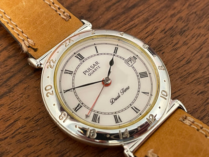 (1988) Pulsar V339-6000 GMT  “Dual Time” dress watch - white dial w/ Roman numerals (NOS)