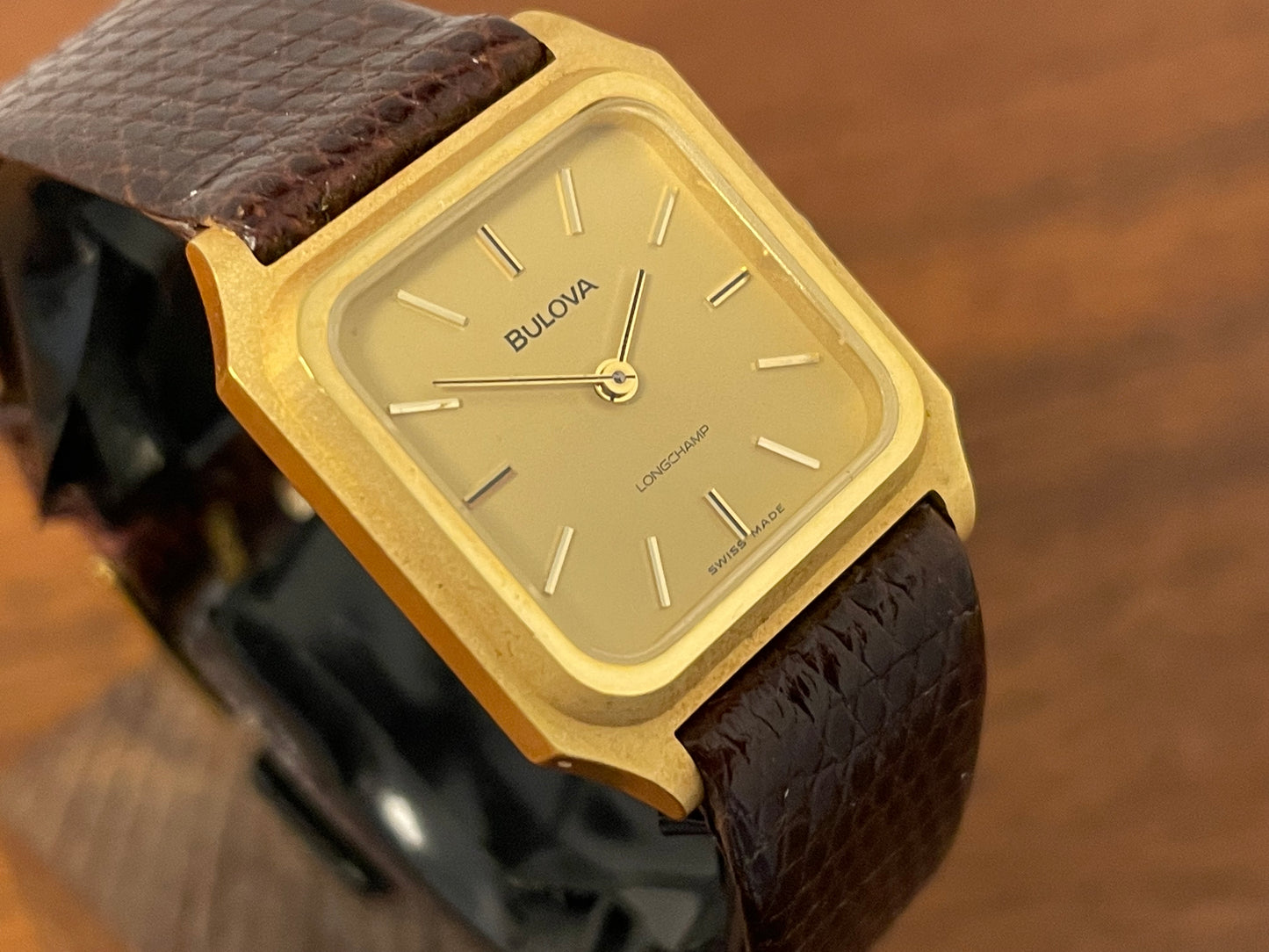 (1982) Bulova Longchamp "Tank" dress watch - gold case w/ champagne dial - small size (NOS)