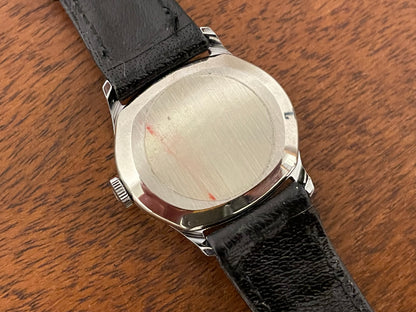 (1970s) Tissot 052-15007 Stylist dress watch - silver cushion case - silver brushed dial w/ silver stick markers - small size (NOS)