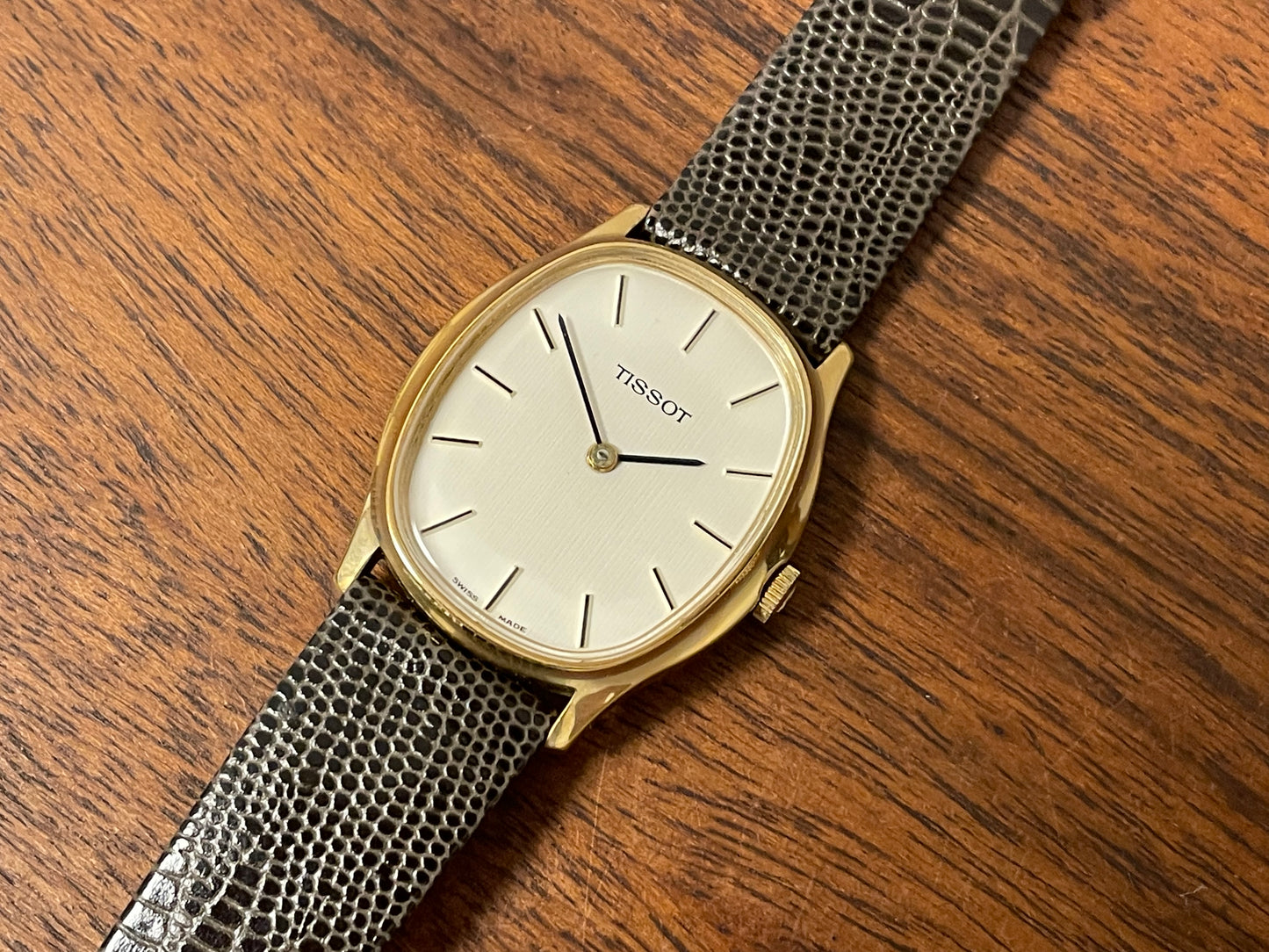 (1970s) Tissot 41141 "Ellipse" dress watch - gold case - silver brushed dial w/ gold stick markers (NOS)