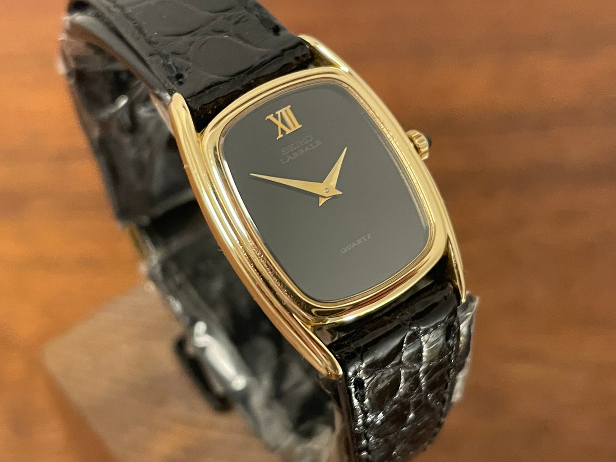 (1980) Seiko 1400-7249 Lassale "Ellipse" dress watch - black dial w/ gold Roman numerals - small size (NOS)