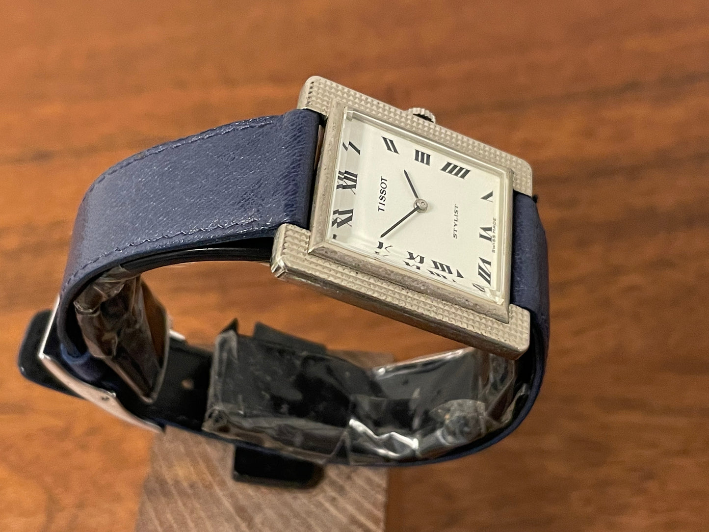 (1970s) Tissot Stylist "Tank" - decorated case - white dial w/ black Roman numerals (NOS)