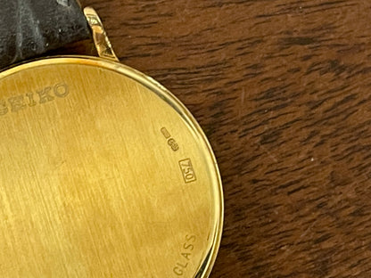 (1994) Seiko 7N00-S007 "Gold" 18K gold collection dress watch - 18k solid gold case - white dial w/ gold markers