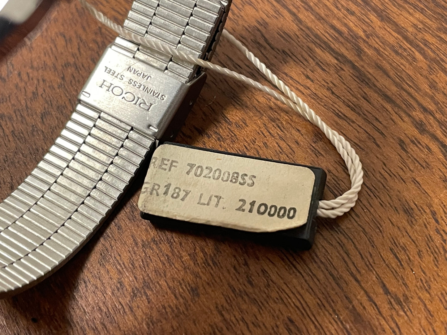 (1977) Ricoh 702008SS dress watch - silver brushed dial w/ silver markers (NOS)