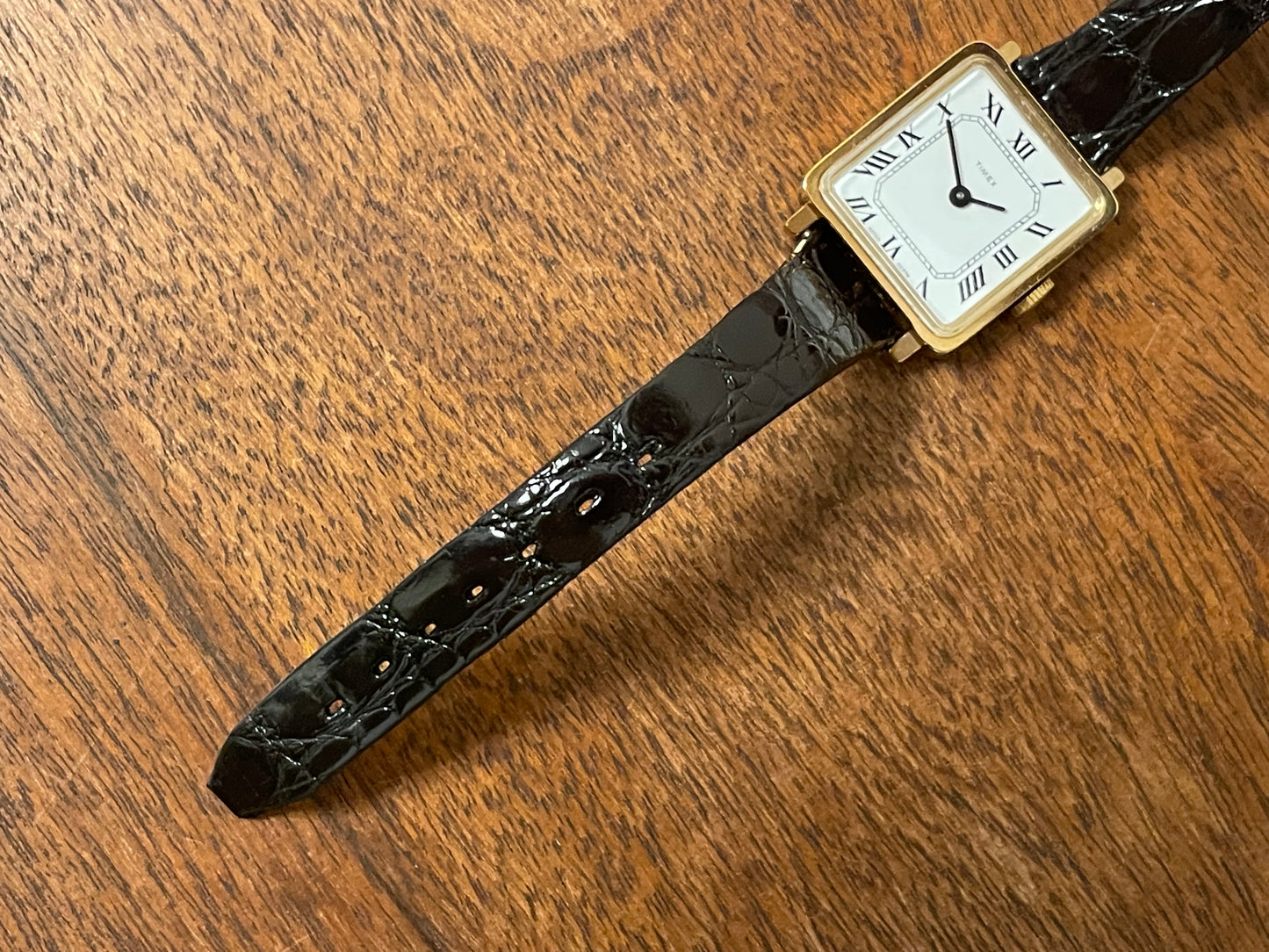 (1970s) Timex 527-201 "Tank" dress watch - gold case - white dial w/ Roman numerals - small size (NOS + Full set)