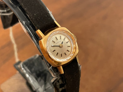 (1970s) Certina 2850 "cocktail" dress watch - silver sunburst dial w/ stick markers - small size (NOS)