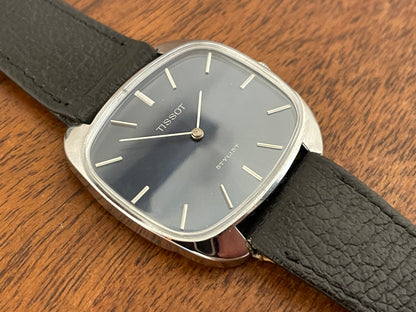 (1970s) Tissot 41436 Stylist dress watch - silver “tv case” - sunburst blue dial w/ silver stick markers (NOS)