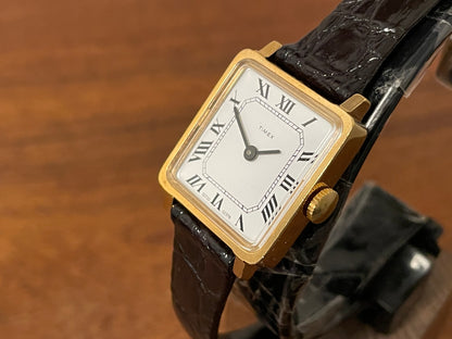 (1970s) Timex 527-201 "Tank" dress watch - gold case - white dial w/ Roman numerals - small size (NOS + Full set)