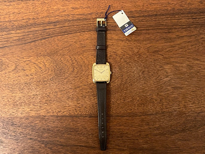 (1970s) Tissot 642-10778 Stylist dress watch - gold square case - gold brushed dial w/ gold stick markers - small size (NOS)