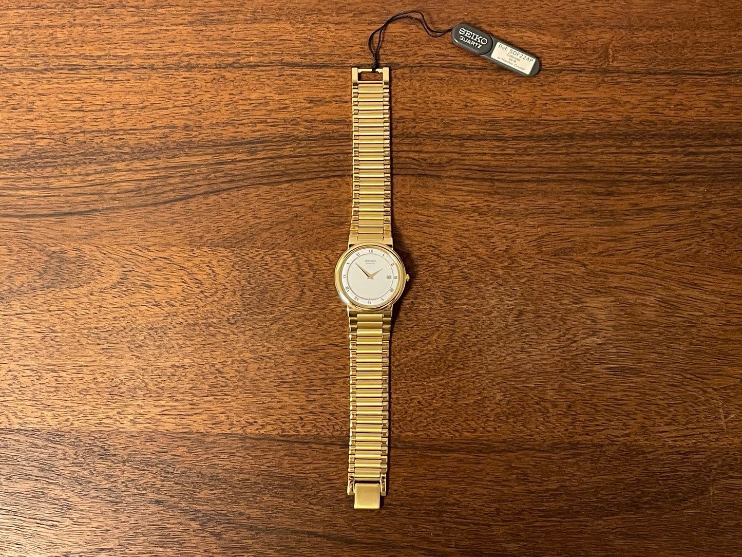 (1992) Seiko 5Y89-7A10 dress watch – white dial w/ Roman numerals & date (NOS)